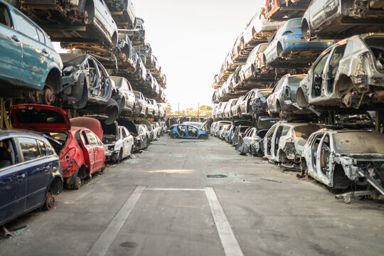Cars stacked in a vehicle scrapyard