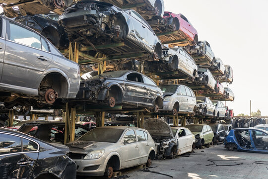 Cars stacked in a vehicle scrapyard
