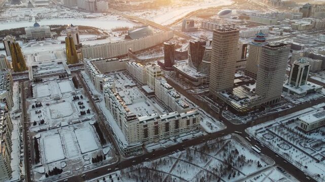 Drone flight above Astana city center with skyscrapers and Baiterek Tower. Capital of Kazakhstan, Qazaqstan