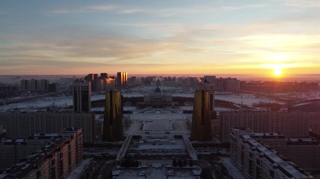 Drone flight above Astana city center with skyscrapers and Baiterek Tower. Capital of Kazakhstan, Qazaqstan