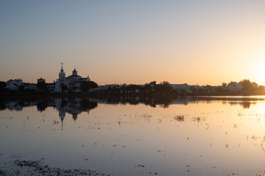 Sunrise Over Marsh With Church Reflection