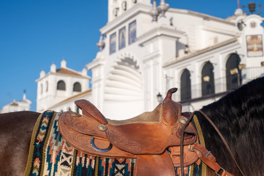Empty Saddle On Mustang In Front Of Church