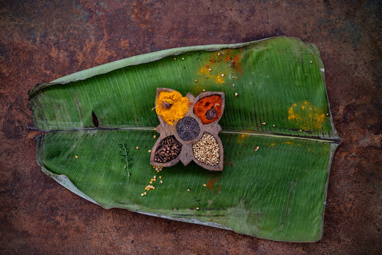 Spices on a banana leaf 