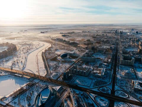 Aerial drone view Nur-Sultan, Kazakhstan Qazaqstan city center with skyscrapers and Baiterek Tower.