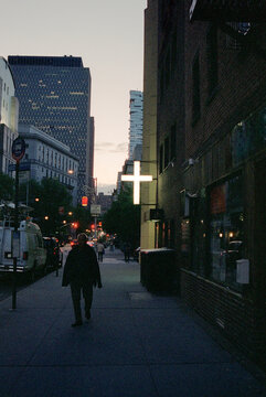 Cross illuminating the street in New York.