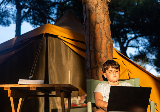Image of a child with their laptop