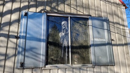 The Grim Reaper on the road in a mobile home