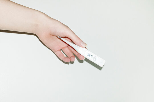 Clinical thermometer with fever sick/ill celcius degrees. 
