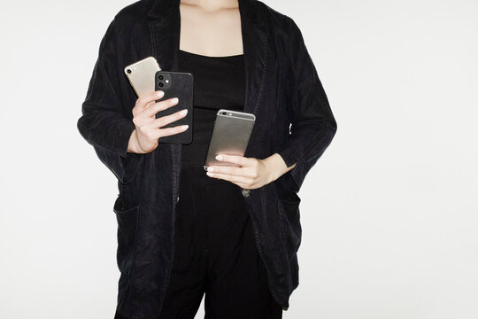 Person wearing formal blazer outfit in business work office with flash