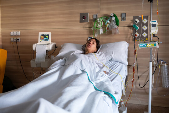 Pregnant Woman In Labor With Monitors And Medical Equipment