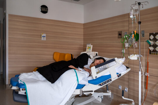 Pregnant Woman Resting In Hospital Bed before labor