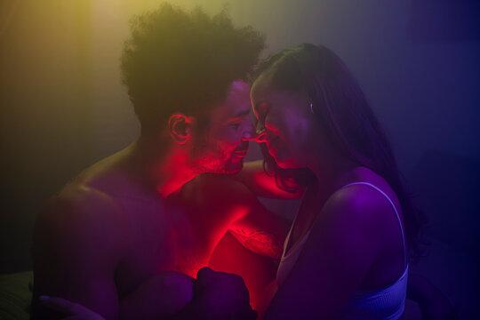 Intimate pregnant couple Connection with dreamy lights