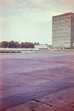 apartment building dominates urban plaza 