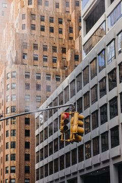 Red Traffic Light in Front of Urban Office Buildings