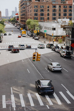 Busy Urban Intersection with Traffic and Crosswalks