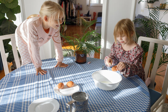  Children are preparing omelette