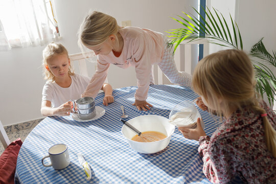 Siblings are preparing breakfast