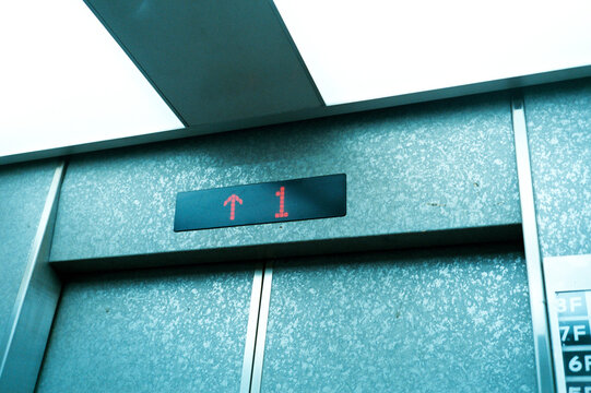 Going up an elevator