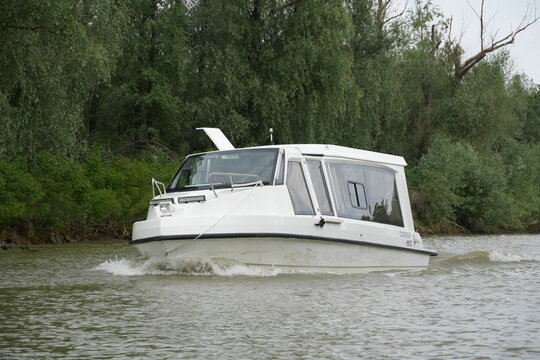 Travel romania tulcea sulina danube delta black sea white boat cruising danube delta river exploring nature