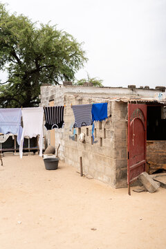 Village life in Senegal with laundry drying outdoors