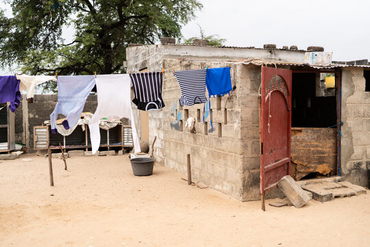 Laundry drying on clothesline in rural Senegal village