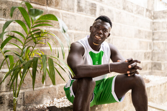 Smiling young man posing in Senegal, Africa