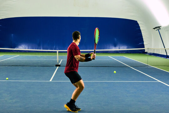 Man at tennis practice