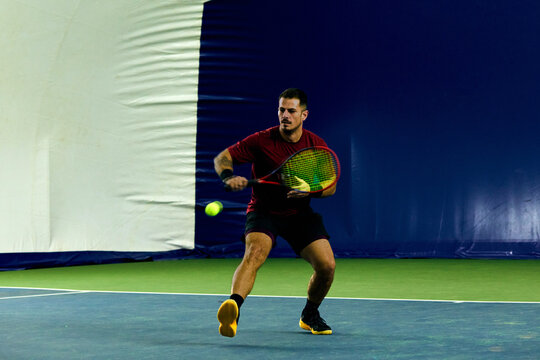 Man prepares to hit the ball