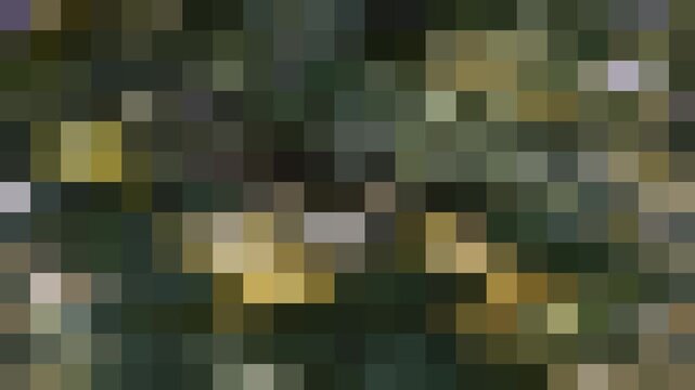 Shimmering khaki squares, camouflage color. Abstract checkered background, digital screen.