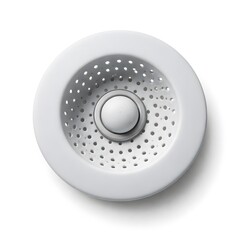 A white sink strainer is placed in a clean kitchen sink during mid-morning hours. It has small holes for drainage and a central knob for easy removal. The kitchen is tidy and uncluttered