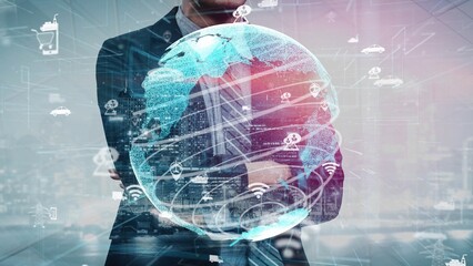 Businessman stands confidently with crossed arms, gazing at a digital globe symbolizing global connectivity and technological advancements in a modern business environment. Xenic © InfiniteFlow