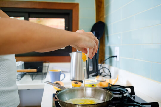 Cracking Egg into Frying Pan