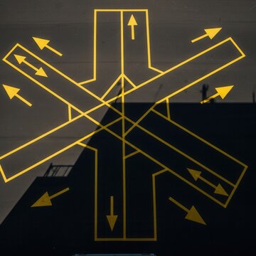 Abstract Geometric Pattern of Intersecting Lines and Arrows Depicting Directional Guidance