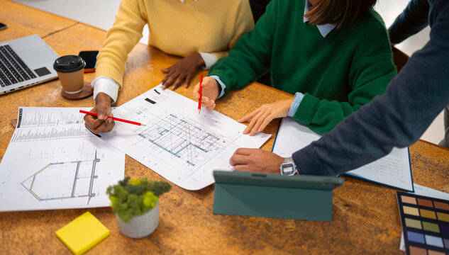 Team works on project in workspace
