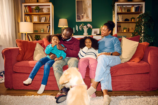 Happy household spends time at home