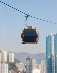 Busan Air Cruise, Busan cable car, ride on multicoloured sky capsule gondola route, with Songdo beach and Skywalk and Busan Bay panorama, South Korea, Songdo Station in a spring sunny day © tsuguliev