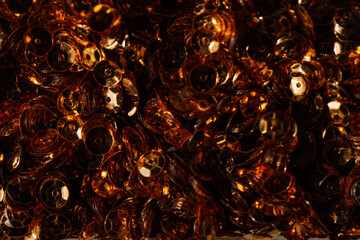 abstract background of dark gold sequins