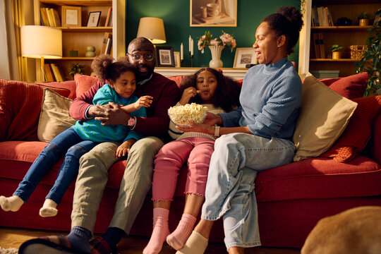 Happy family spends time together at home.