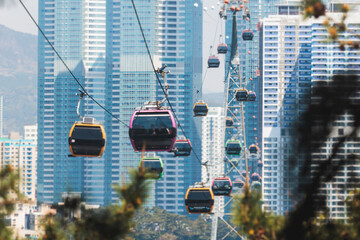 Busan Air Cruise, Busan cable car, ride on multicoloured sky capsule gondola route, with Songdo beach and Skywalk and Busan Bay panorama, South Korea, Songdo Station in a spring sunny day © tsuguliev
