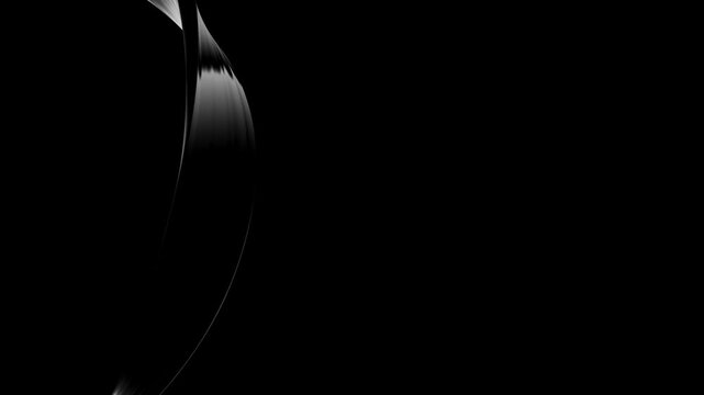 Minimal abstract composition featuring a sleek glossy black curved form emerging from deep shadow with subtle highlights creating a futuristic and luxurious visual atmosphere