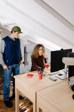 Professional paying close attention to a colleague&rsquo;s feedback