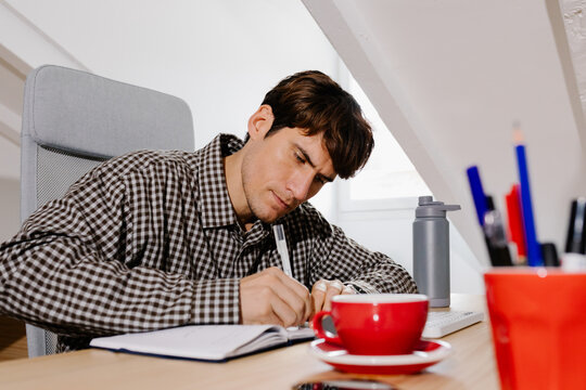 Office worker doing remote work from a home office
