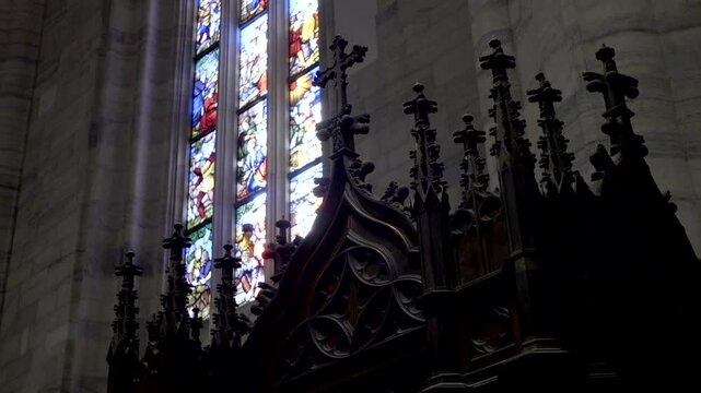 Milan, 04-10-2022. Silhouette confessional Interior Cathedral Milan. Video 4K