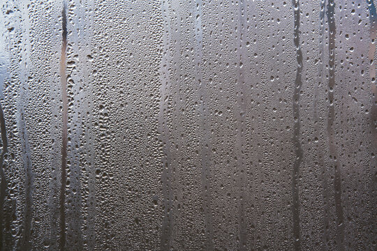 Closeup of water droplets on window glass