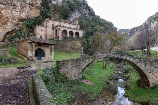 Tobera romanesque hermitage and medieval bridge over river