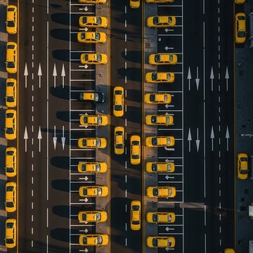 Aerial View of Yellow Taxi Cabs in Organized Rows, Urban Transportation, Cityscape Perspective