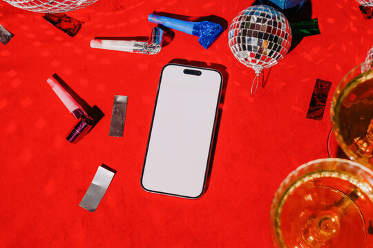 Phone Mockup On Red Festive Table Scene