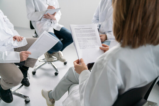 Group Discusses Research Findings in a Laboratory 