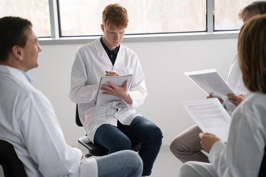Group Discussion on Medical Topics in a Bright Room