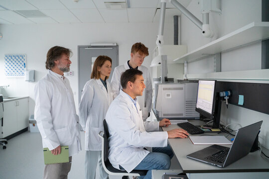 Scientists Work Together in a Laboratory 